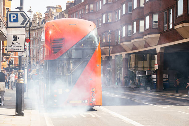 A city bus emitting gases