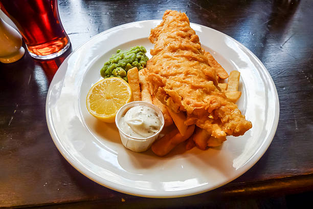 London UK, September 03 2025,  British Favourite Fish And Chips With Mushy Peas And No People
