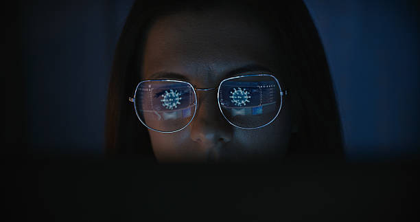 istock Female scientist working on a computer. Results of a human cell research displayed on the computer screen reflecting in eyeglasses. Medical science research 2214701676