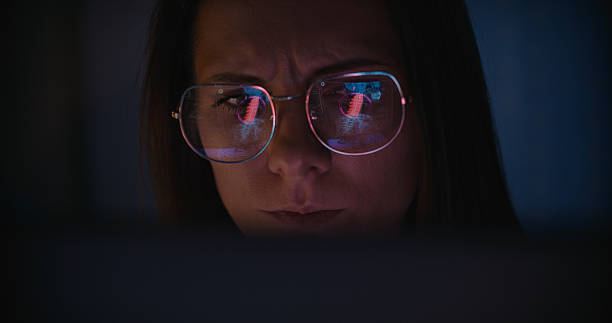 istock Female scientist working on a computer. 3D model showing inflammation in the spine displayed on the computer screen reflecting in eyeglasses. Medical science research 2214702851
