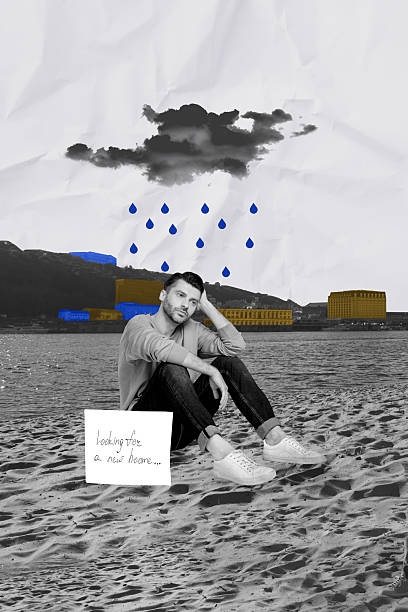 istock Vertical composite collage picture of sad guy sit sand looking for a new home rainy cloud isolated on creative background 2214705012