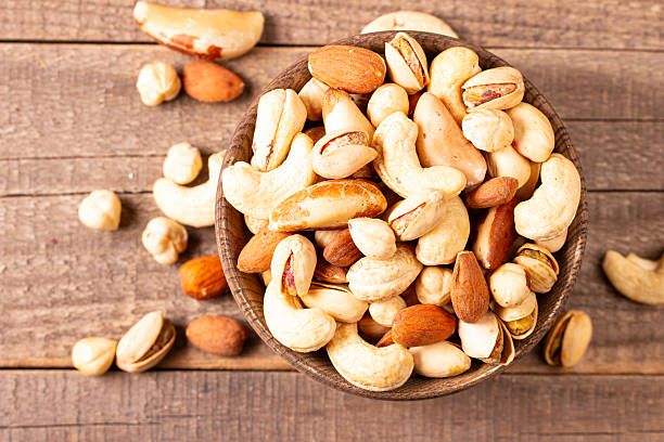 istock Healthy mix nuts. Almonds, hazelnuts, cashews, peanuts, pistachios, Brazil nuts 2214707344