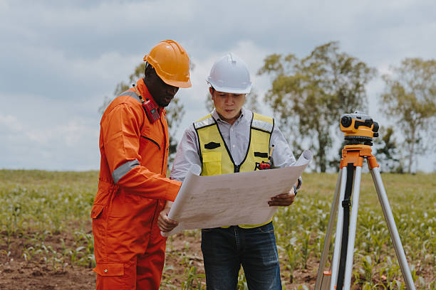 istock Surveying engineers take measurements using surveying cameras at road and high-speed railway construction sites or conduct safety inspections. 2214712200