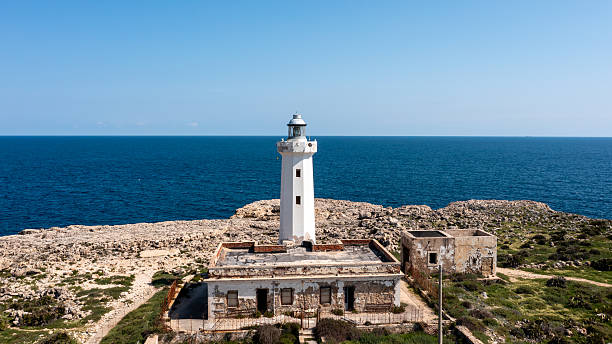 istock Lighthouse on rugged coast near Syracuse 2214712482