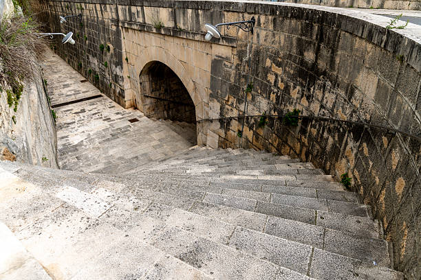istock Historic Stone Staircase and Archway in Ragusa 2214712508