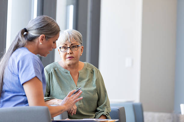 istock Doctor and Patient in a Private Consultation 2214715923