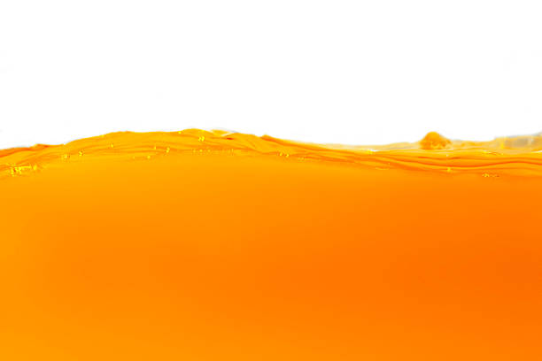 istock fresh orange juice with bubbles and waves for Healthy 2214719423