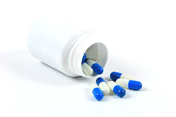 A bottle of medicine on white background