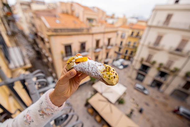 Cannolo with a city view stock photo