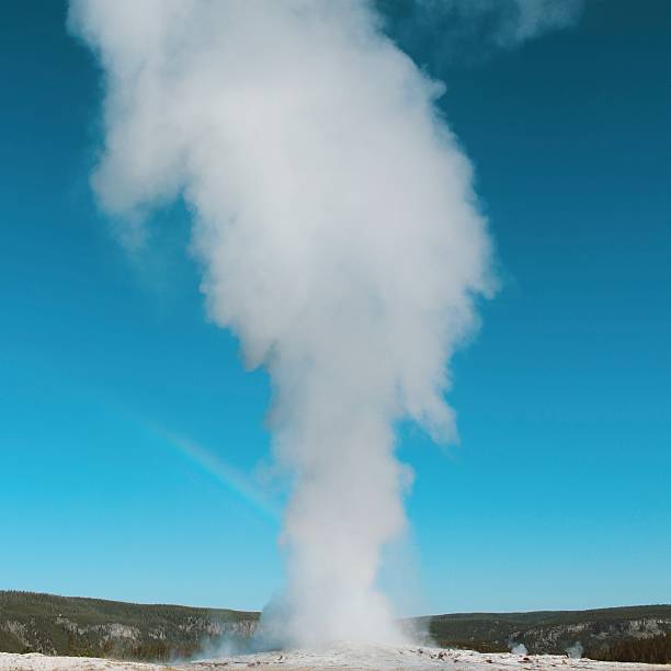 istock Rainbow Over Old Faithful 2214724494