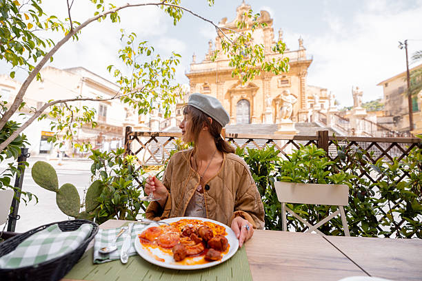 Traditional Sicilian lunch with wine in Modica