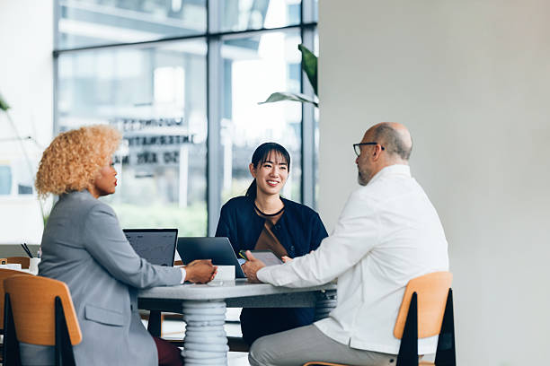 istock Professional Business Team Collaborating During a Meeting in a Modern Office 2214727201