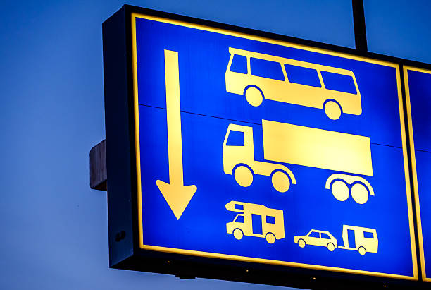 istock Traffic signage indicating vehicle type restrictions at a transportation hub during twilight hours 2214736683