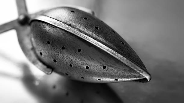 Kitchen tool. Abstract composition. Macro texture of an old metal kitchen tool with shallow depth of field