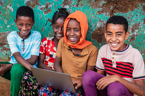 istock African children using laptop, East Africa 2214739052