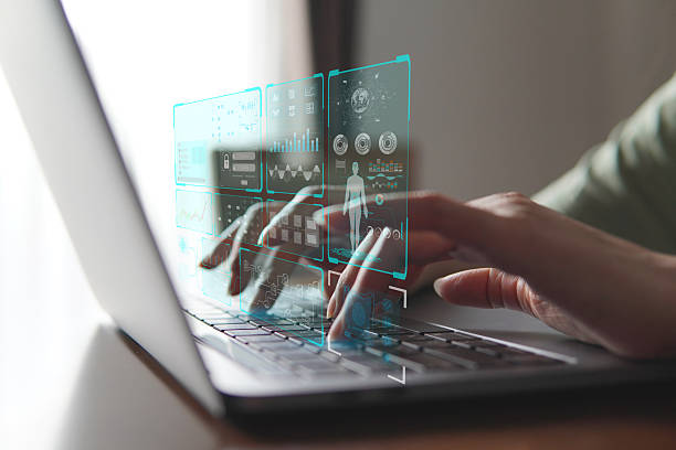 istock Business people using laptop with futuristic cloud management dashboard — displaying server stats, file control, and performance analytics. 2214740161
