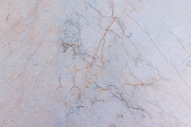 istock Beige natural marble with cracks as floor or wall surface 2214741802