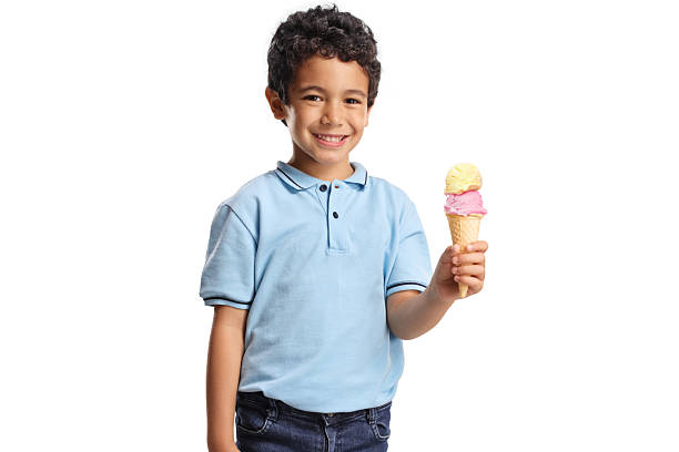 istock Boy holding vanilla and strawberry ice cream in a cone 2214741881