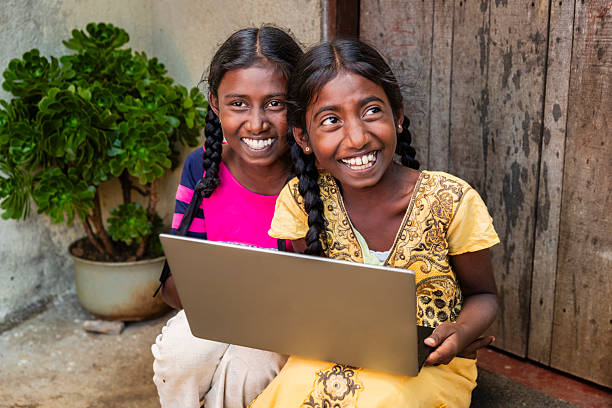 istock Sri Lankan young girls using a laptop 2214745243