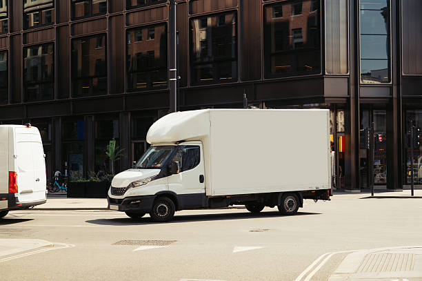istock Delivery van in a city 2214748999