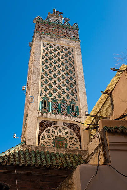 istock Beautiful old architectural tower in a blue sky in Fez, Morocco 2214751002