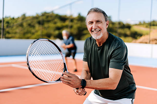 istock Ratrato senior men playing tennis 2214754805