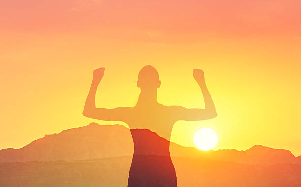 istock Strong woman flexing her muscles. 2214758802