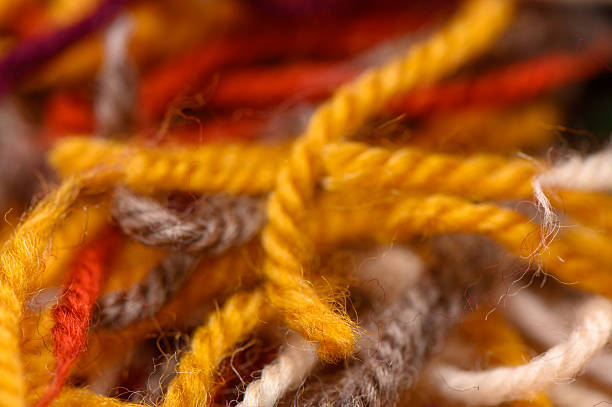 istock Soft wool yarn balls in vibrant colors, macro view. Ideal for handmade projects, textile ads, and knitting-focused content. 2214766393