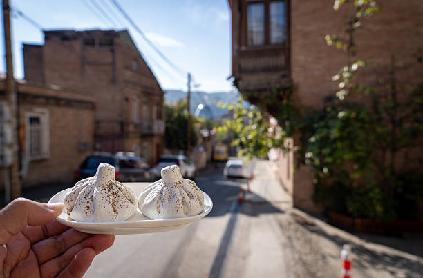 istock Khinkali with the Holy Trinity Cathedral Backdrop 2214766402