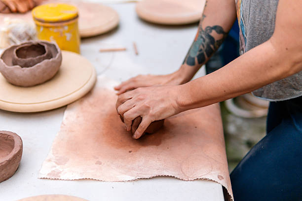 istock Potter molding clay for earthenware product in workshop 2214766932