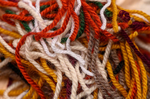 istock Bright and textured yarn threads for knitting in vibrant colors. Macro shot captures soft fibers and rich textile details. 2214766998