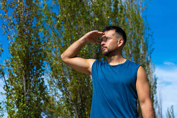 istock Athletic man looking into the distance 2214768435