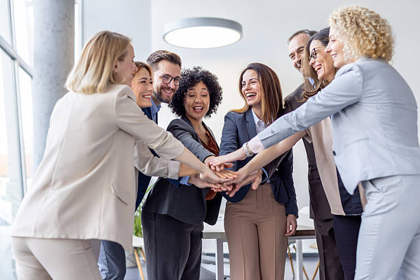 istock Team of Professionals Embracing Group Success Together 2214771360