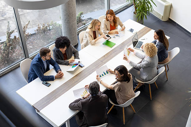 istock Team Collaboration in a Modern Office Meeting Space 2214771369