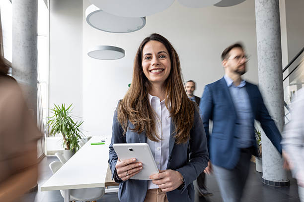 istock Energetic Businesswoman in Collaborative Workspace 2214771404