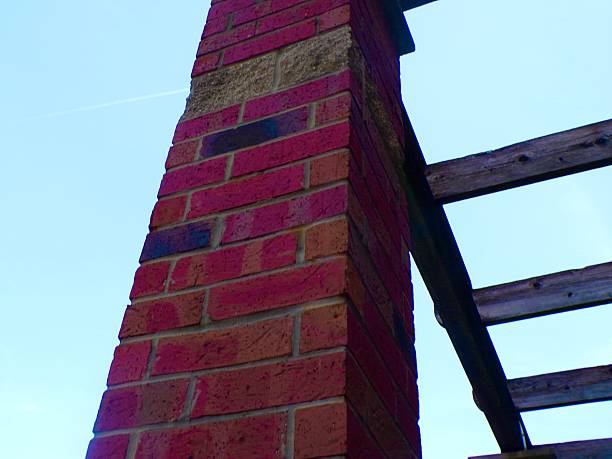 istock Brick column with wooden beams. 2214773946
