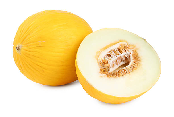 istock Whole and cut ripe melons isolated on white 2214776085
