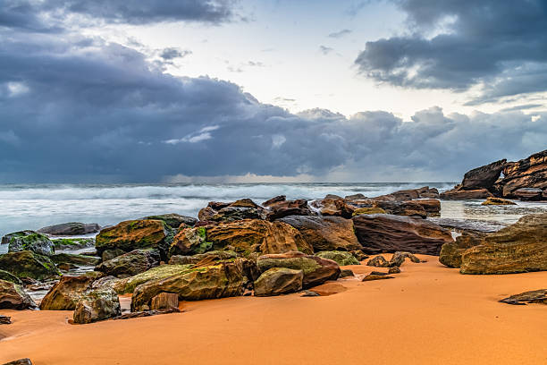 Moody sunrise seascape at Killcare Beach on the Central Coast of NSW, Australia.