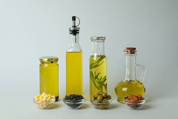 istock Set of different oils on light gray background 2214786242