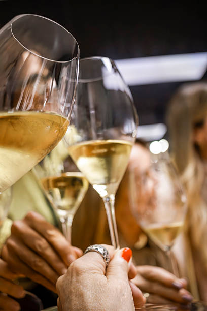 istock Friends toasting with champagne flutes at a celebration 2214786252
