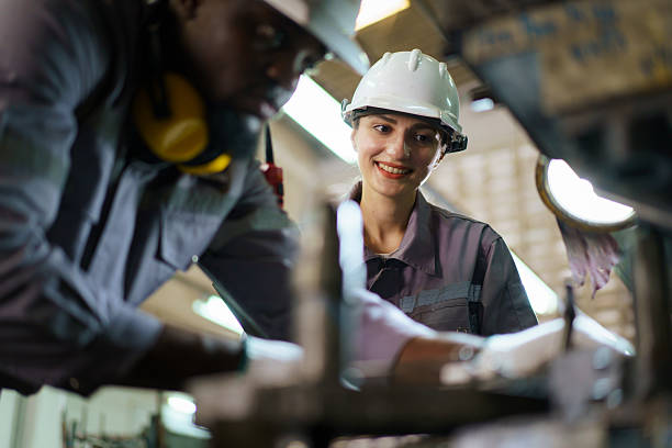 istock A technicians team working together in factory. A workers inspecting machines 2214790576