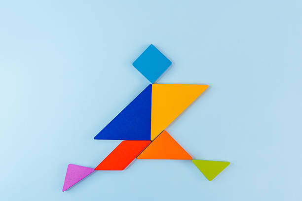 Tangram puzzle depicting a man on a blue background, conceptual image, place for text