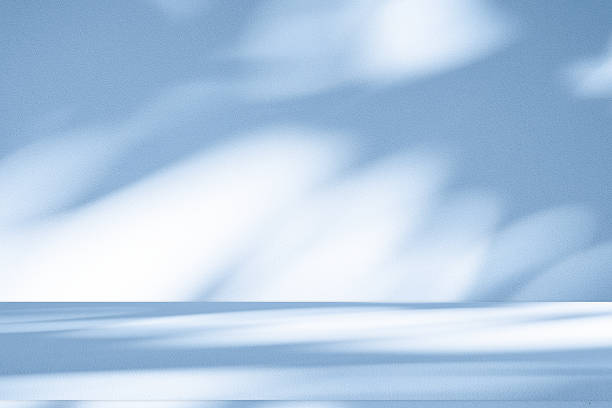 istock Studio style background wall decoration presentation uses white and blue tones. with shadows cast from a nearby window, concept creating a decorative 2214796009
