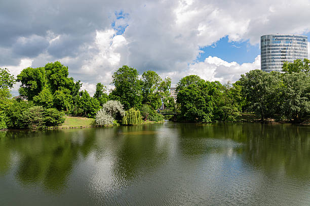 istock Landscape with lake, trees and clouds 2214797570
