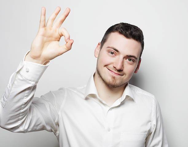 istock business man man going thumbs up 2214798799