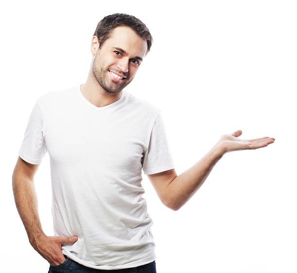 istock Young smiling happy man shows something 2214798837