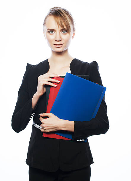 Business, finance and people concept:  businesswoman with folders isolated on white