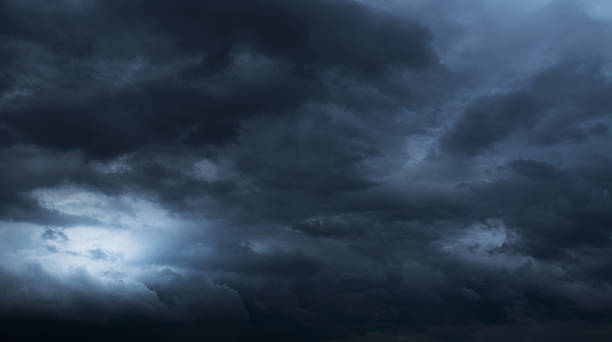 istock Sky full of dark stormy clouds 2214801130