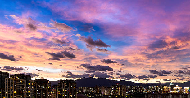 City buildings under the beautiful evening sky
