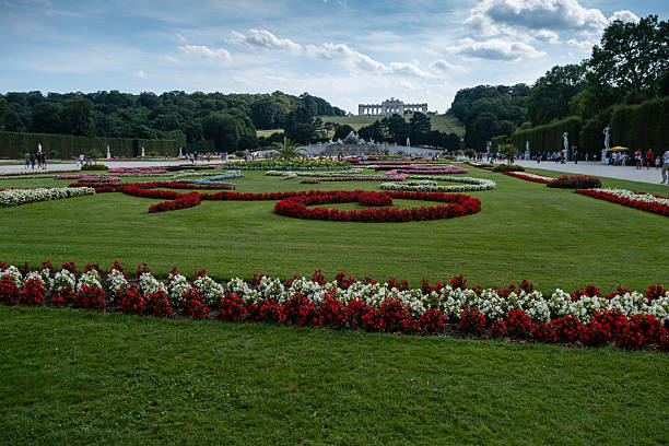 Vienna, Austria - August 15, 2019: Schonbrunn Palace. Gloriette, the Neptune Fountain and Great Parterre